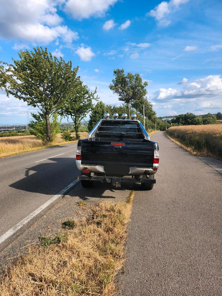Mitsubishi L200 пробіг: 194000 рік: März 2004 Diesel потужність:116 PS коробка: Manuell ціна: 6000 - Фото 3