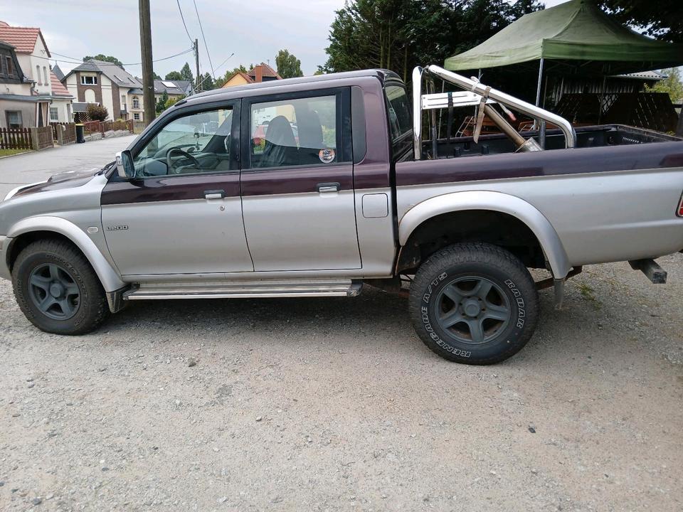 Mitsubishi l200 пробіг: 260000 рік: August 2003 Diesel потужність:115 PS коробка: Manuell ціна: 5750 - Фото 0