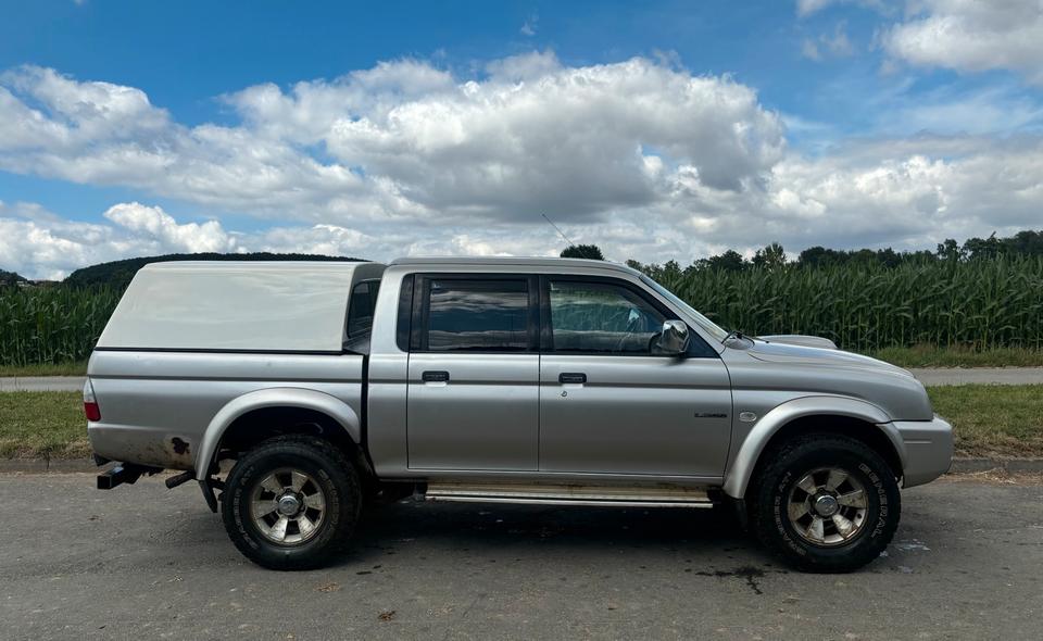 Mitsubishi L 200 reserviert bis Montag. пробіг: 205370 рік: Juni 2004 Diesel потужність:133 PS коробка: Manuell ціна: 3500 - Фото 2