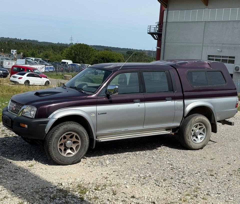 Надійне авто для військових Mitsubishi L200 Pick-Up Double Cab 2.5TD 4x4 American Sport пробіг: 231000 рік: Mai 2002 Diesel потужність:116 PS ціна: 4800 - Фото 0