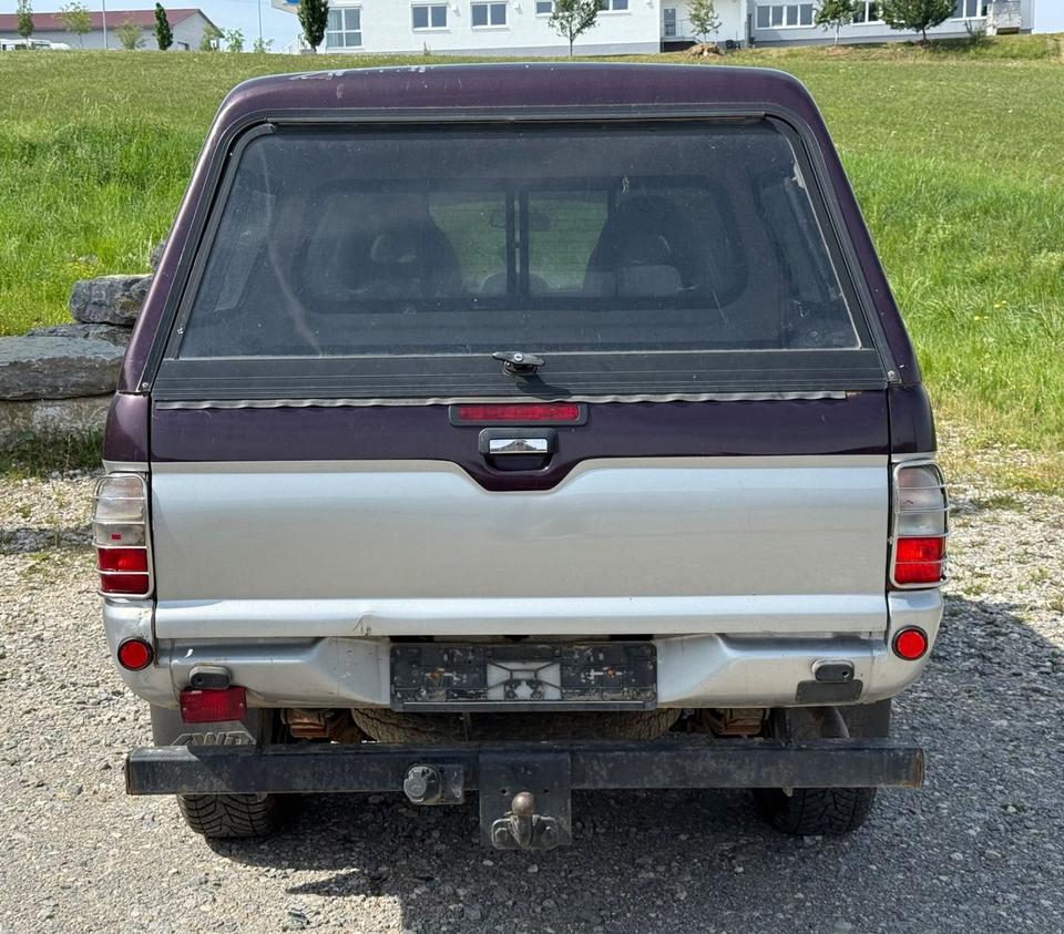 Надійне авто для військових Mitsubishi L200 Pick-Up Double Cab 2.5TD 4x4 American Sport пробіг: 231000 рік: Mai 2002 Diesel потужність:116 PS ціна: 4800 - Фото 2