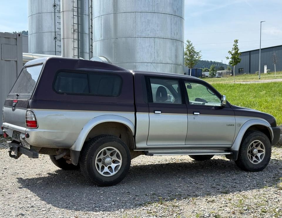 Надійне авто для військових Mitsubishi L200 Pick-Up Double Cab 2.5TD 4x4 American Sport пробіг: 231000 рік: Mai 2002 Diesel потужність:116 PS ціна: 4800 - Фото 3