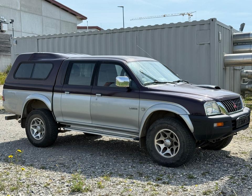 Надійне авто для військових Mitsubishi L200 Pick-Up Double Cab 2.5TD 4x4 American Sport пробіг: 231000 рік: Mai 2002 Diesel потужність:116 PS ціна: 4800 - Фото 4