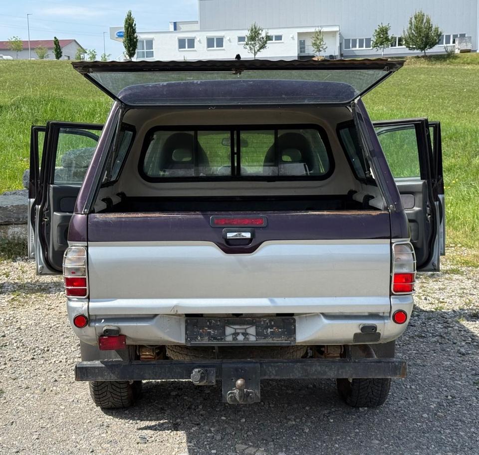 Надійне авто для військових Mitsubishi L200 Pick-Up Double Cab 2.5TD 4x4 American Sport пробіг: 231000 рік: Mai 2002 Diesel потужність:116 PS ціна: 4800 - Фото 7