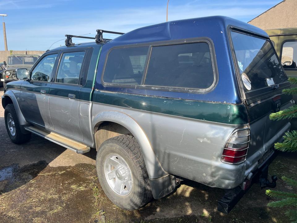 Mitsubishi L200 2.5 TD  L-Reihe пробіг: 214859 рік: März 2003 Diesel потужність:116 PS коробка: Manuell ціна: 5999 - Фото 2