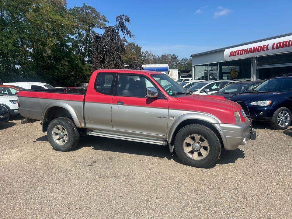  Дпомога з купівлі та пригону надійного авто Mitsubishi L200 TD Intense Club Cab 2500  пробіг: 270000 рік: März 2005 Diesel потужність:116 PS коробка: Manuell ціна: 3000 - Фото 3