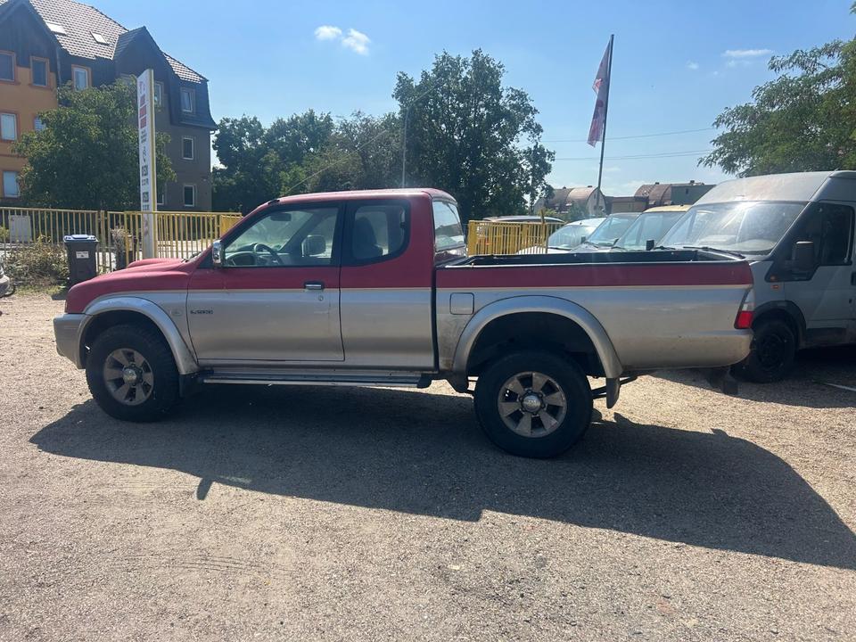  Дпомога з купівлі та пригону надійного авто Mitsubishi L200 TD Intense Club Cab 2500  пробіг: 270000 рік: März 2005 Diesel потужність:116 PS коробка: Manuell ціна: 3000 - Фото 4