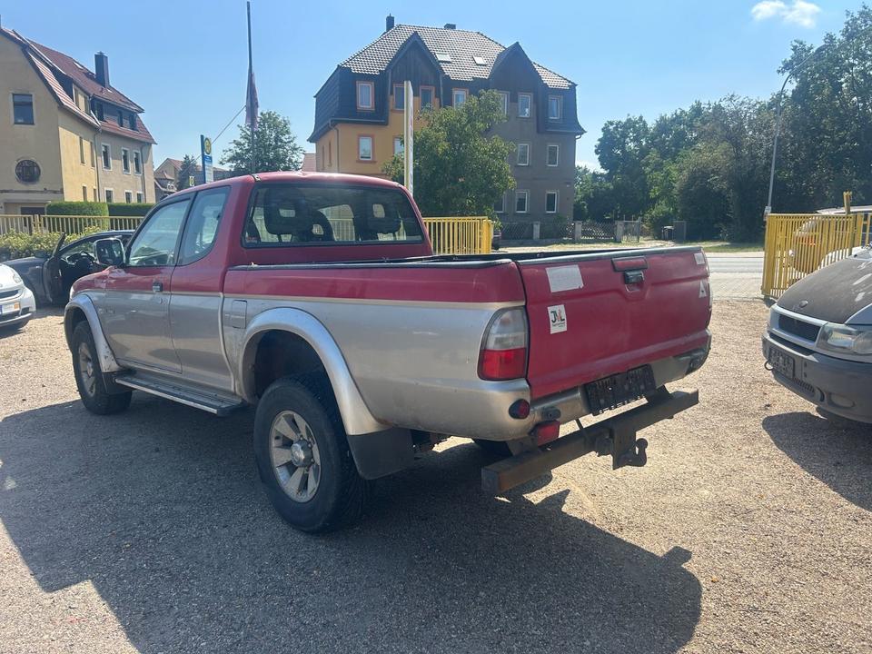 Дпомога з купівлі та пригону надійного авто Mitsubishi L200 TD Intense Club Cab 2500  пробіг: 270000 рік: März 2005 Diesel потужність:116 PS коробка: Manuell ціна: 3000 - Фото 6