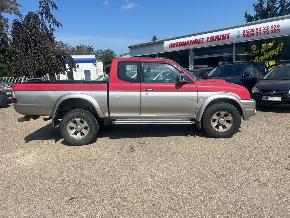  Дпомога з купівлі та пригону надійного авто Mitsubishi L200 TD Intense Club Cab 2500  пробіг: 270000 рік: März 2005 Diesel потужність:116 PS коробка: Manuell ціна: 3000 - Фото 7