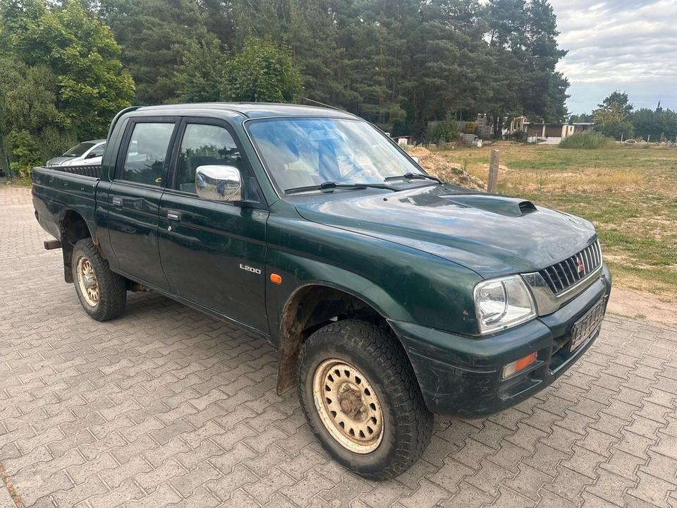 Mitsubishi L200 2.5TD  4X4 пробіг: 162400 рік: Februar 1999 Diesel потужність:99 PS коробка: Manuell ціна: 4790 - Фото 0