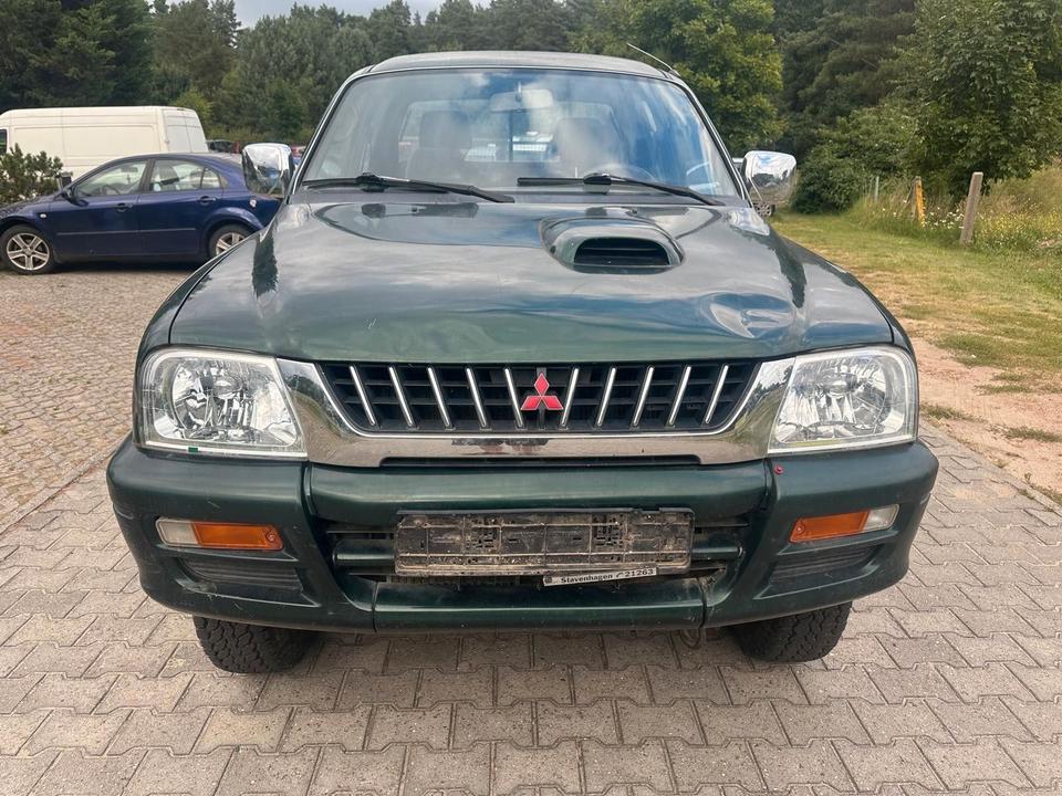 Mitsubishi L200 2.5TD  4X4 пробіг: 162400 рік: Februar 1999 Diesel потужність:99 PS коробка: Manuell ціна: 4790 - Фото 1