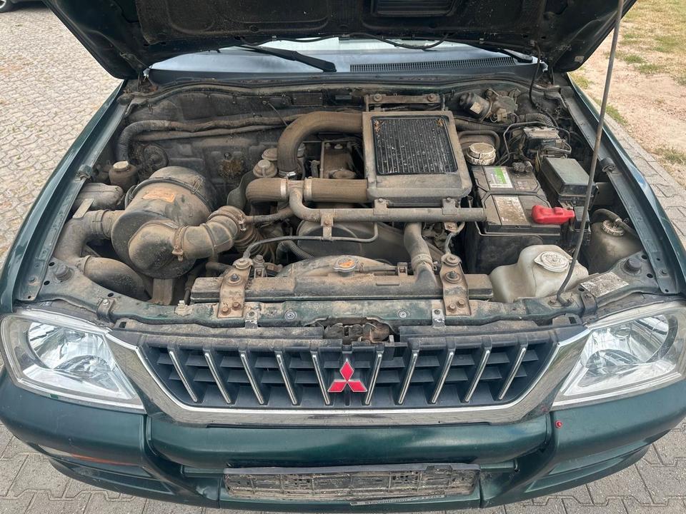 Mitsubishi L200 2.5TD  4X4 пробіг: 162400 рік: Februar 1999 Diesel потужність:99 PS коробка: Manuell ціна: 4790 - Фото 11