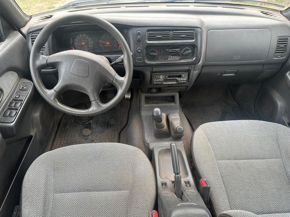 Mitsubishi L200 2.5TD  4X4 пробіг: 162400 рік: Februar 1999 Diesel потужність:99 PS коробка: Manuell ціна: 4790 - Фото 7