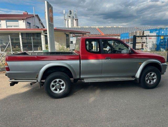 Mitsubishi L200 пробіг: 136000 рік: Februar 2002 Diesel потужність:99 PS ціна: 4999 Rot - Фото 2