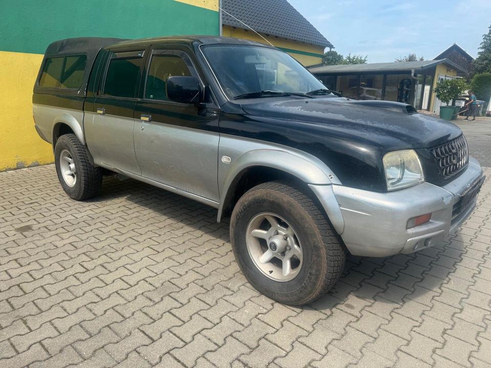 Mitsubishi L200 пробіг: 290000 рік: Mai 2002 Diesel потужність:116 PS коробка: Manuell ціна: 2900 - Фото 1