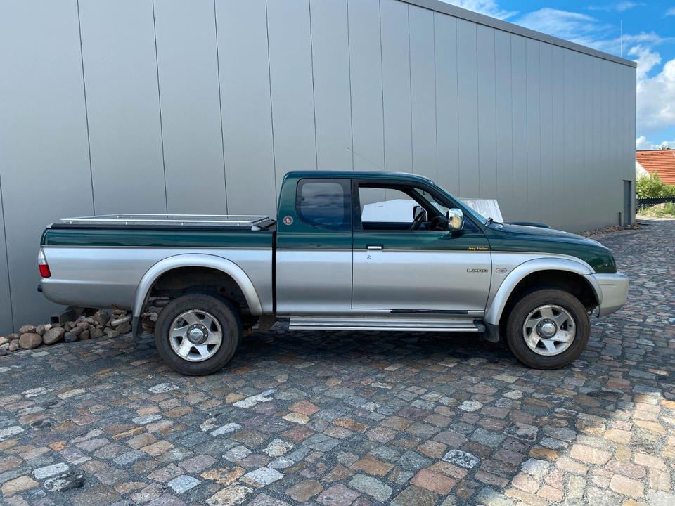Mitsubishi L200 AHK пробіг: 139450 рік: Juni 2003 Diesel потужність:116 PS коробка: Manuell ціна: 4990 Grün - Фото 1