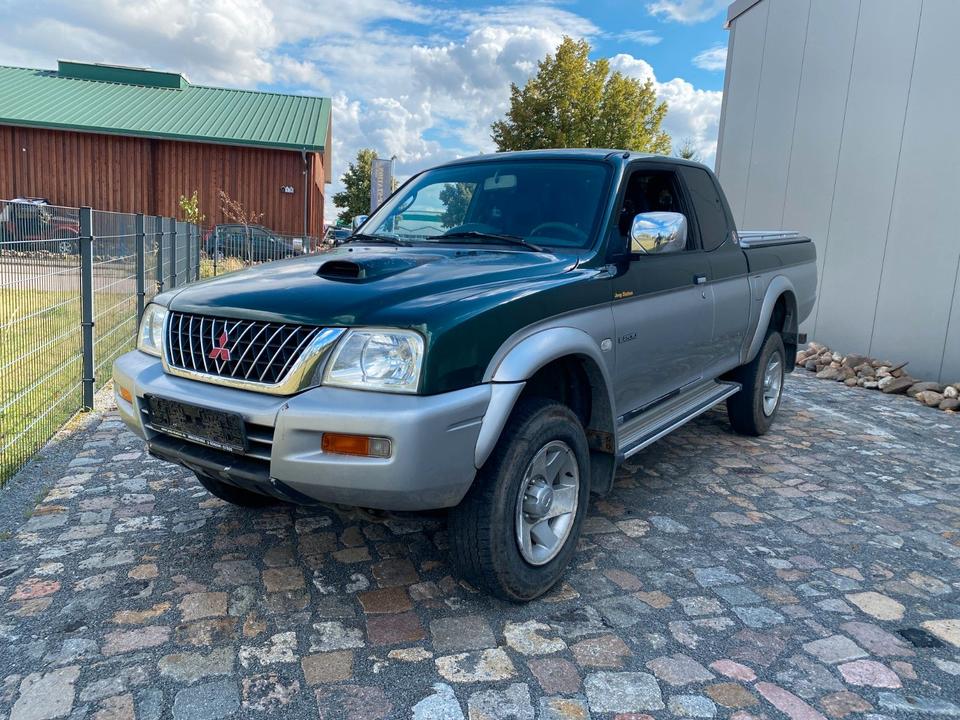 Mitsubishi L200 AHK пробіг: 139450 рік: Juni 2003 Diesel потужність:116 PS коробка: Manuell ціна: 4990 Grün - Фото 12