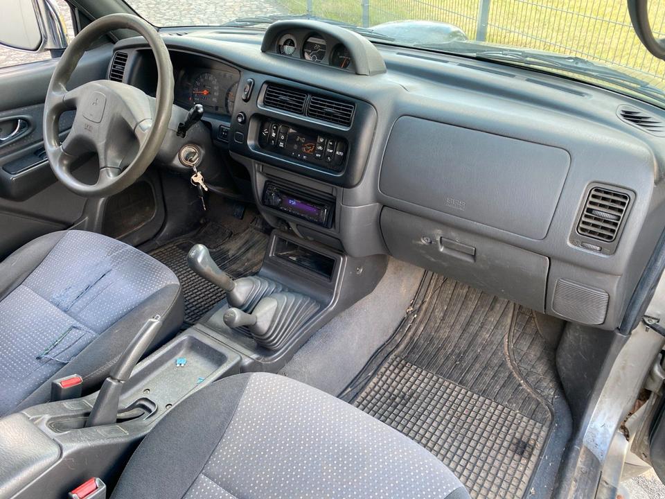 Mitsubishi L200 AHK пробіг: 139450 рік: Juni 2003 Diesel потужність:116 PS коробка: Manuell ціна: 4990 Grün - Фото 18