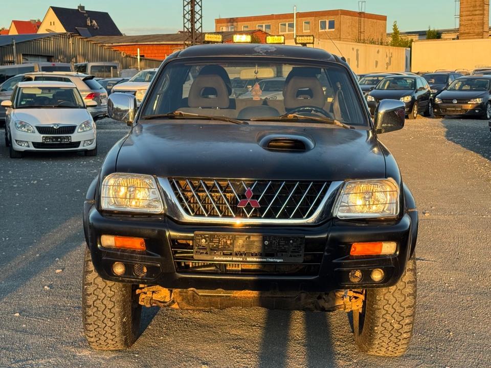Mitsubishi L200 пробіг: 242824 рік: August 2003 Diesel потужність:116 PS коробка: Manuell ціна: 4499 - Фото 1