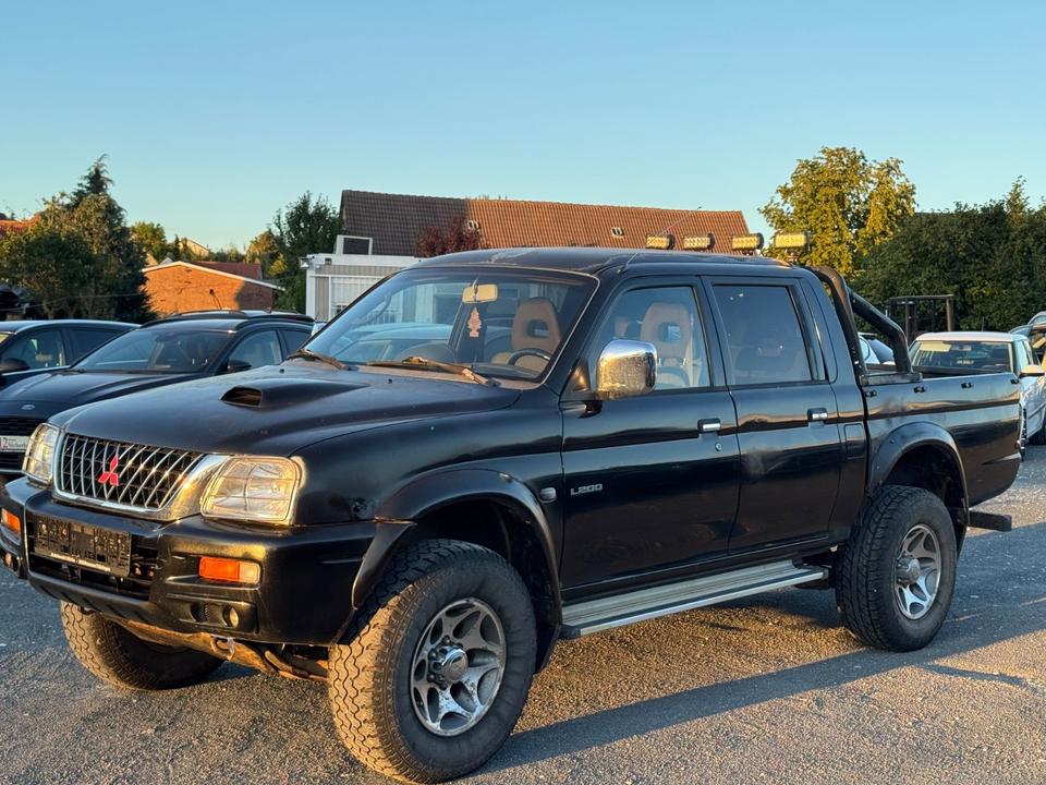Mitsubishi L200 пробіг: 242824 рік: August 2003 Diesel потужність:116 PS коробка: Manuell ціна: 4499 - Фото 2