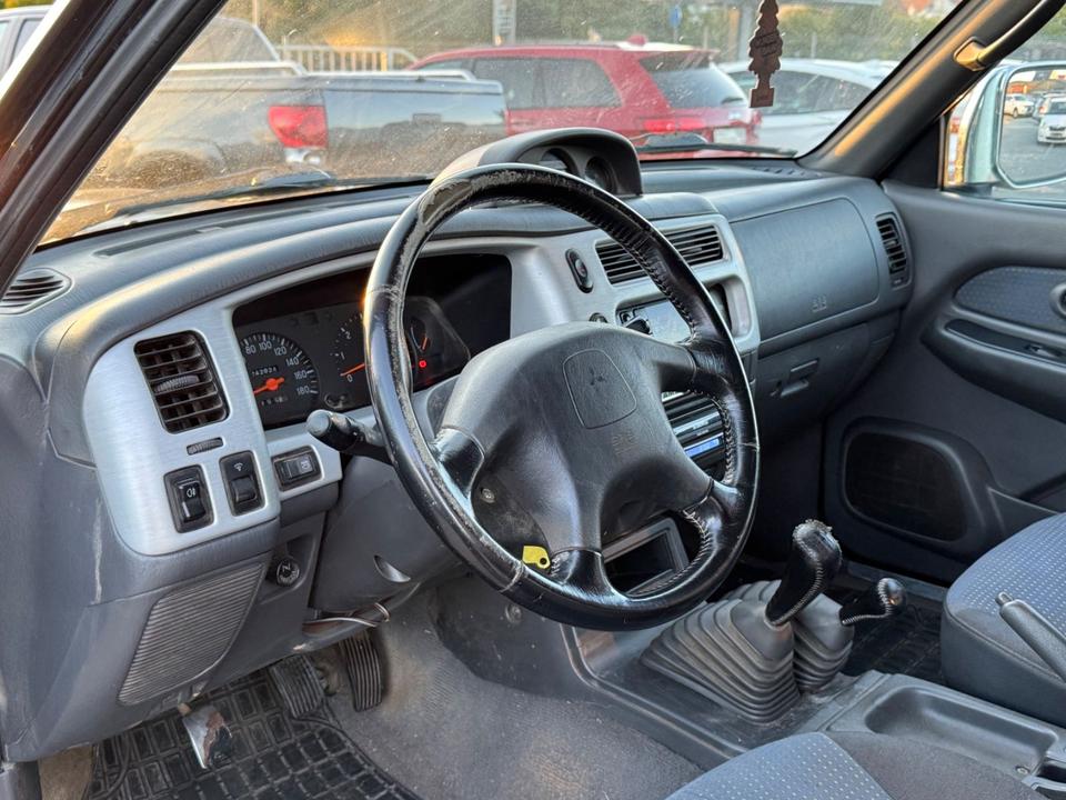 Mitsubishi L200 пробіг: 242824 рік: August 2003 Diesel потужність:116 PS коробка: Manuell ціна: 4499 - Фото 7