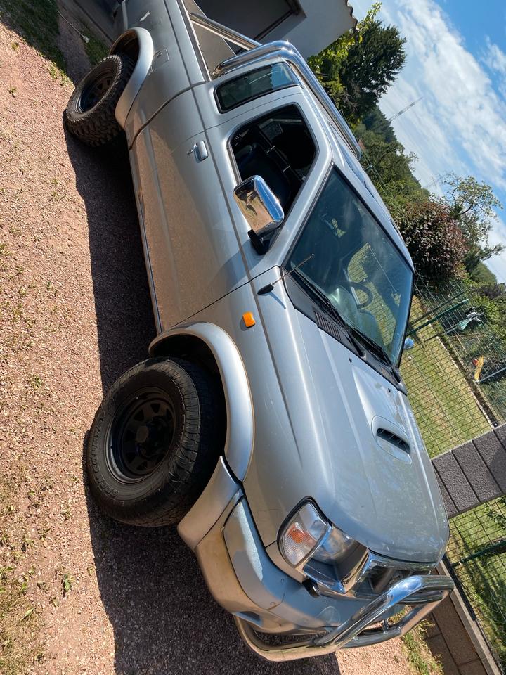 Nissan pick up  mit Hardtop 4x4  d22 пробіг: 298000 рік: Januar 2002 Diesel потужність:103 PS коробка: Manuell ціна: 4200 Silber - Фото 0