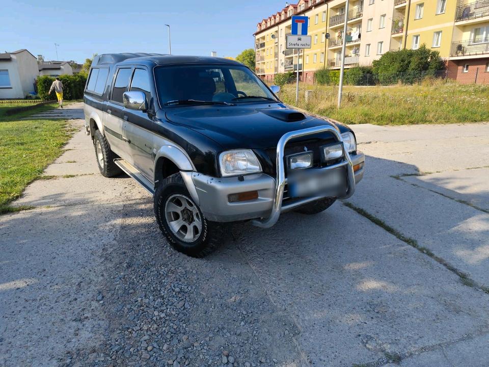 MITSUBISHI L200 DOUBLE CAB 2.5 TD AUTOMATIK пробіг: 384000 рік: Januar 2005 Diesel потужність:133 PS коробка: Automatik ціна: 5000 - Фото 0