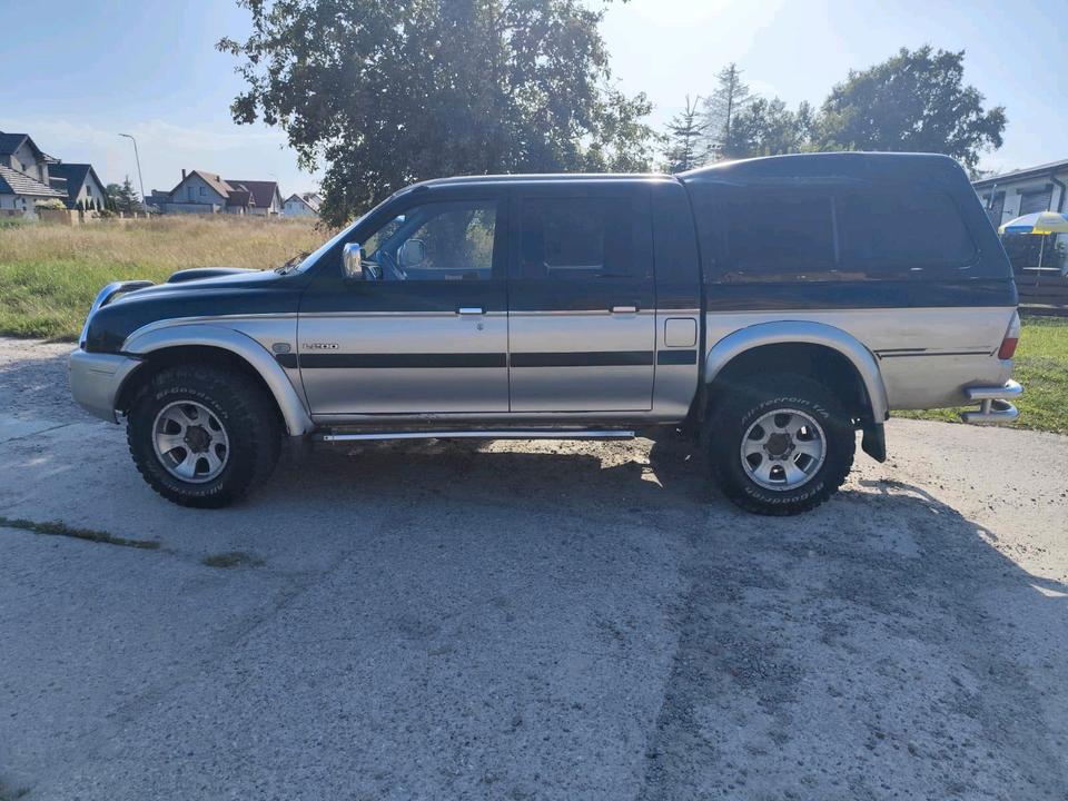 MITSUBISHI L200 DOUBLE CAB 2.5 TD AUTOMATIK пробіг: 384000 рік: Januar 2005 Diesel потужність:133 PS коробка: Automatik ціна: 5000 - Фото 3